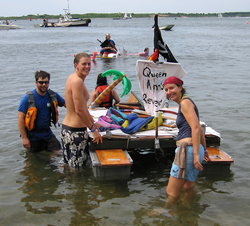 The crew launching the Queen Anne's Revenge