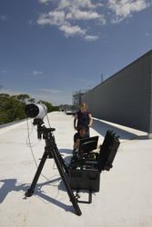 Jason Kapit and Anna Michel testing a laser spectrometry system.