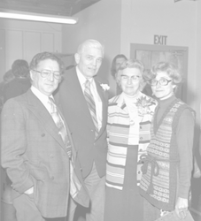 William Ramsey with guests at his retirement party