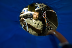 Sean Kelley installing the Alvin personnel sphere wiring harness.