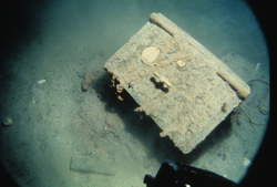 Rust covered safe in the debris field of Titanic.