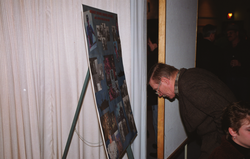 Hartley Hoskins looking at a poster at Bob Ballard's retirement party.