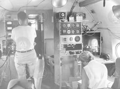 Andy Bunker and Margaret Chaffee inside C54Q aircraft