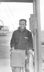 Unidentified man working on deck of R/V Chain.