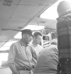 William E. Schevill (left) working on board during Thresher search.