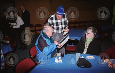Elazar Uchupi and Linda Lucier talking to another guest at Ballard's retirement party.