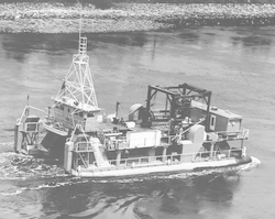 Full view of early version of Lulu traveling through Cape Cod Canal
