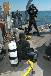 Divers, on Tioga deck, donning their gear