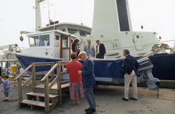 People touring the research boat Mytilus on its christening day.