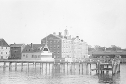 Left to right: MBL Candle House, MBL Club, and WHOI (Bigelow Building), rear view.