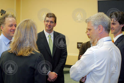 Scott Doney talking with attendees prior to hearing.