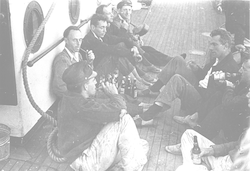 Group relaxing on deck of Atlantis