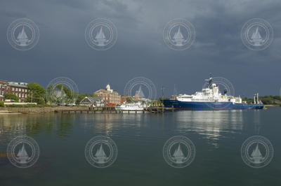 OceanQuest charter boat at dock and R/V Knorr at WHOI dock.