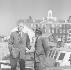 Columbus Iselin and Admiral Edward Smith on the WHOI dock.