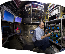 Phil Forte working on the life support system in the Alvin sphere.