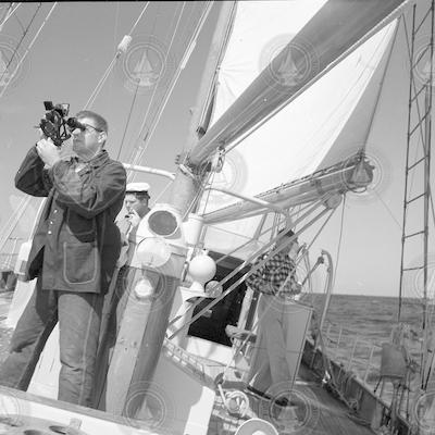 Bercaw and Frantz on deck of Aries, under sail.