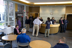 Colloquium attendees arriving in Redfield Lobby.