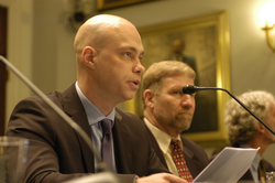 Robert Evans speaking at Congressional hearing.