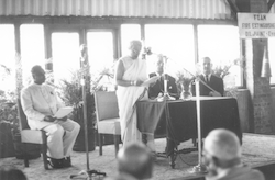 Madam Pandit at microphone, John Ryther on right