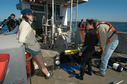 2004 Ocean Science Journalism Fellows aboard Tioga with divers.