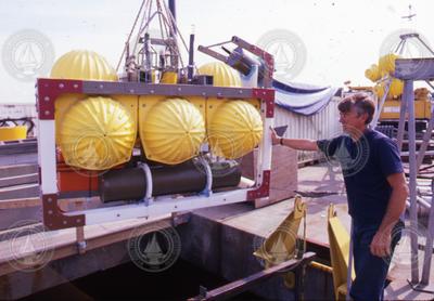 F. Beecher Wooding testing OBS instrumentation at the WHOI dock.