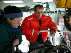 Sarah Zimmermann and Bob Pickart inspect Niskin bottles on the CTD rosette.