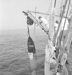 Bottom dredge being recovered on Atlantis.