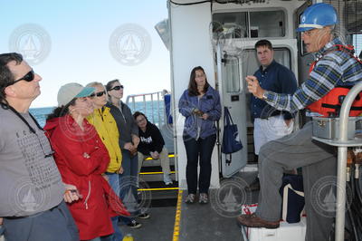 Sandy Williams (right) talking with OSJ fellows and WHOI staff.