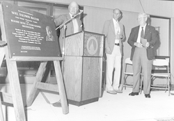 Charles Adams at podium, McLean Lab ceremony