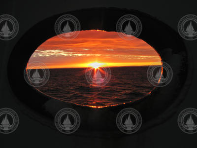 Sunrise in the Bay of Fundy from the Oceanus's bow.