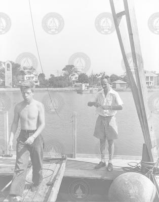 Gerrit Duys and Hilary Moore aboard Euphausia Raft in Eel Pond