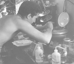 Dave Ross at work in laboratory aboard Chain