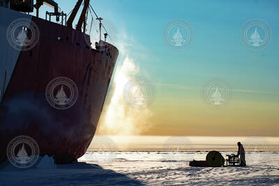 Jeff O'Brien offloading an ITP and winch from the icebreaker.