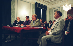 RADM Richard D. West, Nina Young and Peter Tyack giving testimony.