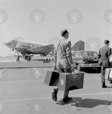 People getting ready to board R4D aircraft