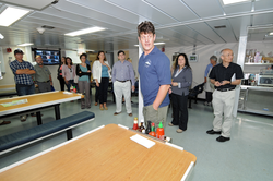 Captain Mike Hoshlyk showing the tour group around R/V Sikuliaq.