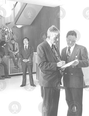 Hoyt Watson and Charlie Innis prepare for Emperor Hirohito's visit at Redfield Lab.