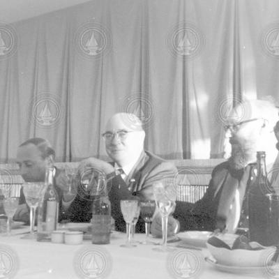 Bostwick Ketchum (center) at unidentified dinner event.