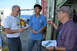 Mike Perfit, Yen Tran and Dana Yoerger discuss Alvin dive plans using Sentry maps.