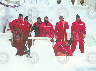 R/V Knorr captain and crew on an ice-covered deck in the Labrador Sea.