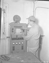 Rocky Miller working in lab aboard Albatross III