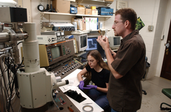 Mike Braun and Jessica Warren working in the lab.