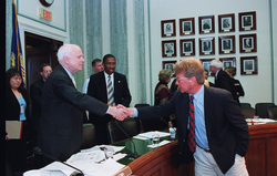 Senator  John McCain greeting Bill Curry