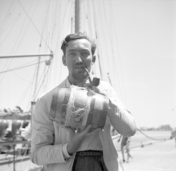 Jan Hahn with keg of rum in Puerto Rico