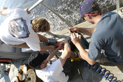 Rocky Geyer in center with postdoctoral investigators Malcolm Scully and Dave Ralston