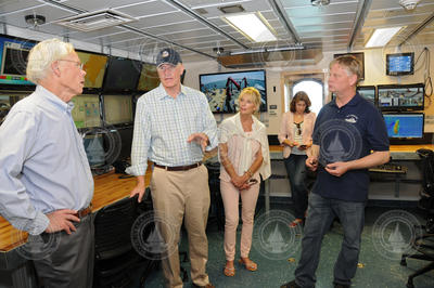 Larry Madin talking to U.S. Rep. William Keating and his wife, Tevis.