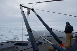 John Kemp looking over the fantail of Oden.