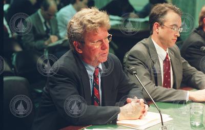 Bill Curry and Philip Mote speaking at a Senate hearing