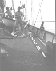 Frank Mather with wave pole on deck