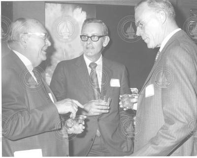 Bostwick Ketchum talking with Guy McLeod and unidentified man.